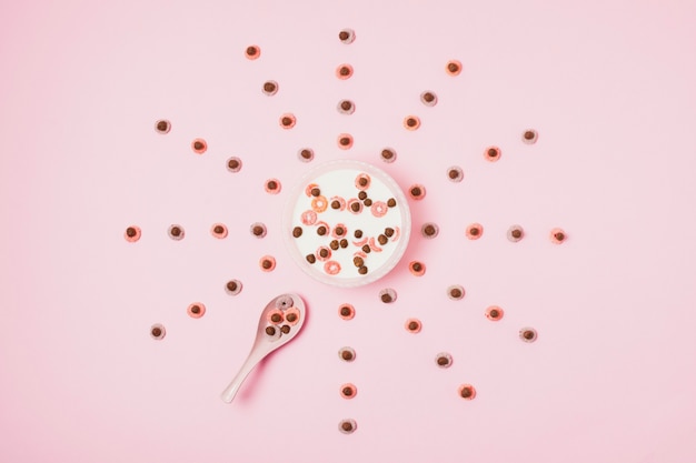 Free Photo flat lay arrangement with cereal bowl and spoon