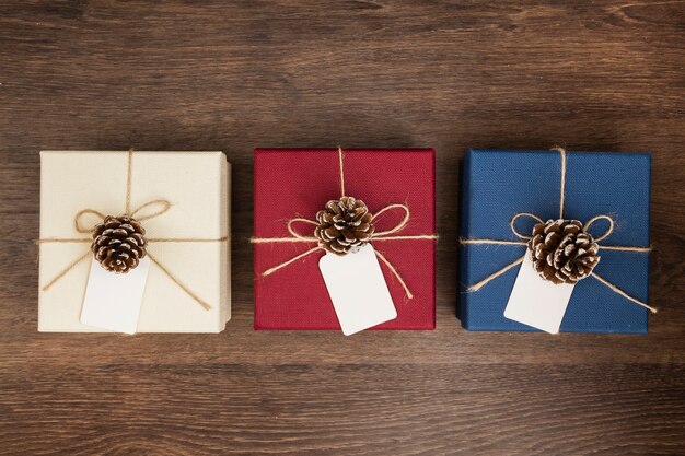 Flat lay arrangement with christmas presents on wooden background