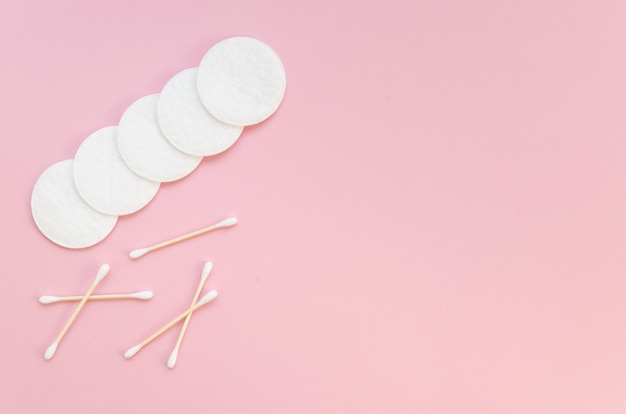 Free Photo flat lay arrangement with cotton pads and ear sticks