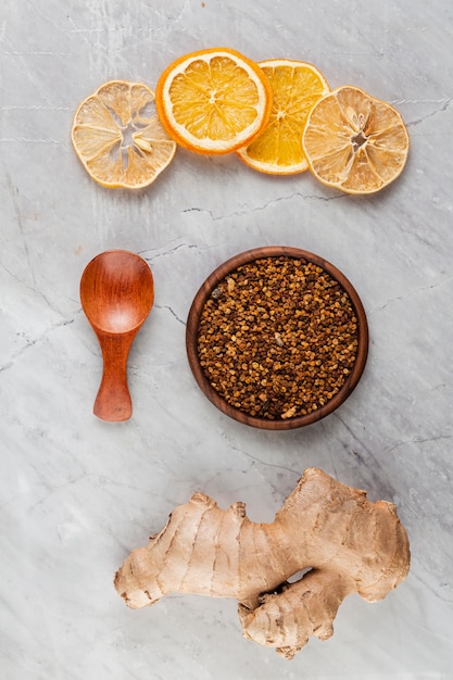 Free Photo flat lay arrangement with orange slices and turmeric