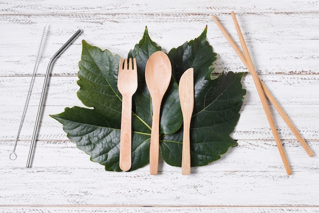 Free Photo flat lay arrangement of zero waste products on wooden background