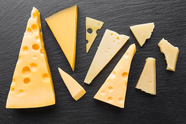 Free photo flat lay assortent of emmental cheese