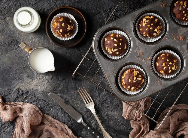 Flat lay assortment of chocolate cupcakes