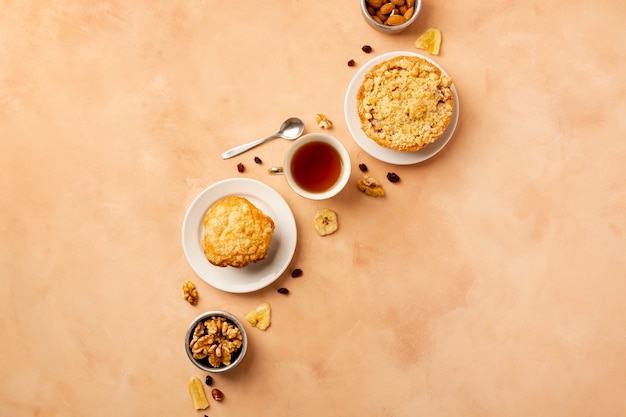 Free photo flat lay assortment with tasty food and orange background