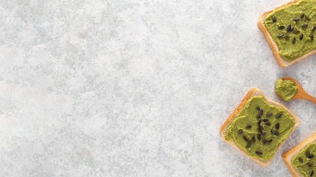 Free photo flat lay avocado toast with seeds and copy-space