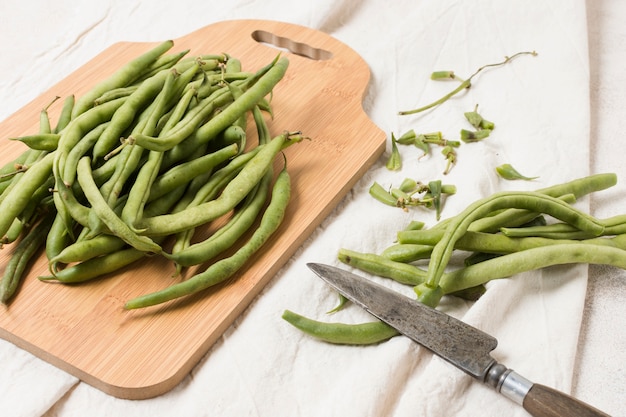 Free Photo flat lay of beans on chopping board