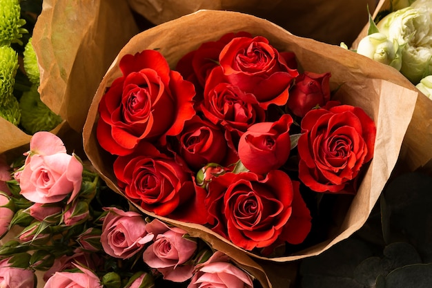 Flat lay of beautifully bloomed colorful rose flowers