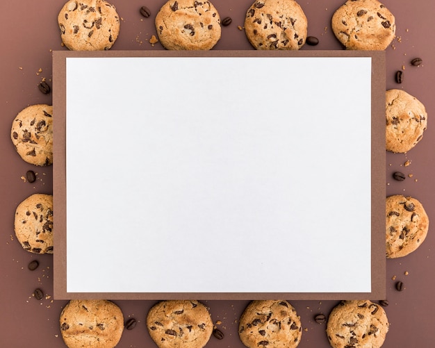 Free photo flat lay of blank menu with cookies