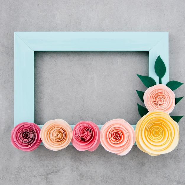 Free photo flat lay blue floral frame