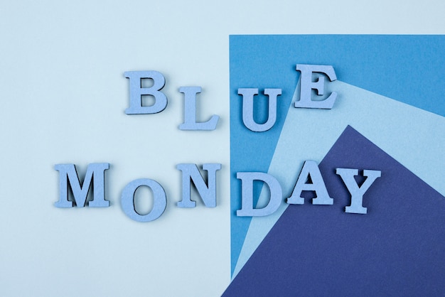 Free photo flat lay of blue monday paper