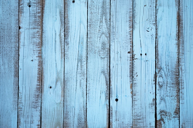 Free photo flat lay blue wooden board background