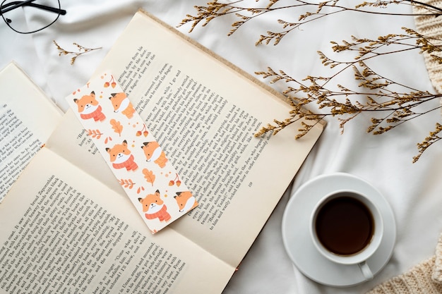 Free Photo flat lay bookmark and book arrangement