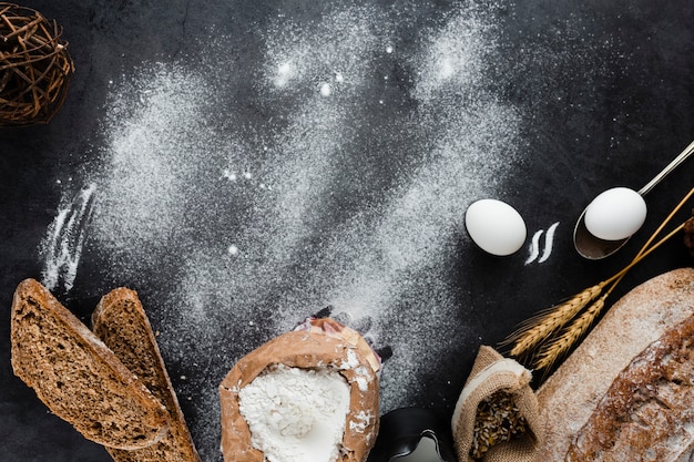 Flat lay of bread ingredients with copy space