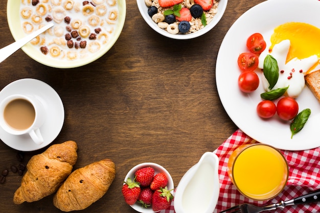 Free Photo flat lay breakfast composition with copyspace