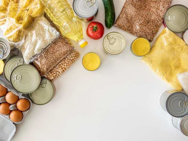 Free photo flat lay of bunch of fresh provisions for donation