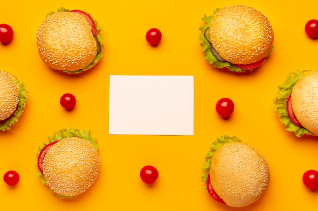 Free Photo flat lay burgers with copy space