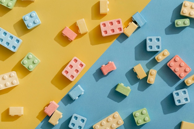 Free Photo flat lay of candy shapes like building blocks