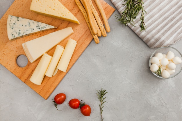 Flat lay cheese composition with copyspace