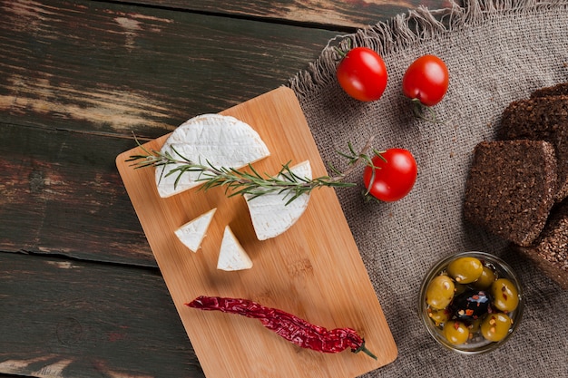 Free photo flat lay cheese composition