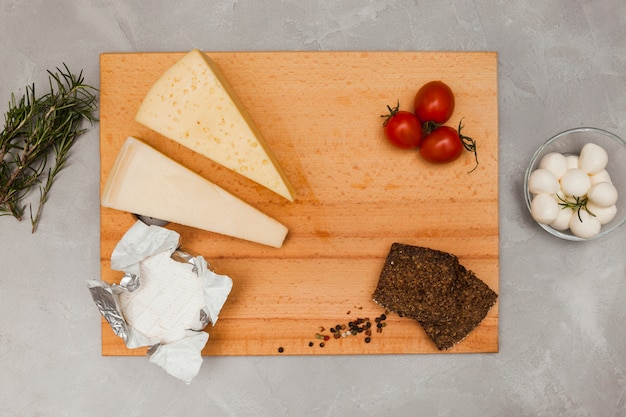 Free photo flat lay cheese composition