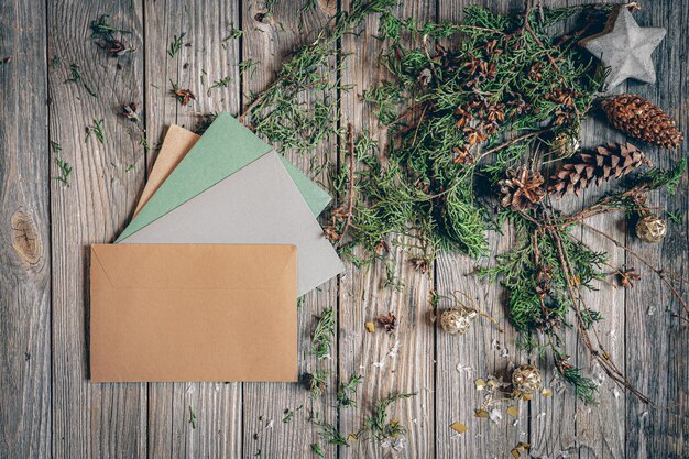 Flat lay christmas composition with letters on a wooden surface