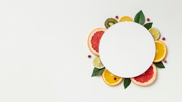 Free photo flat lay of citrus with copy space