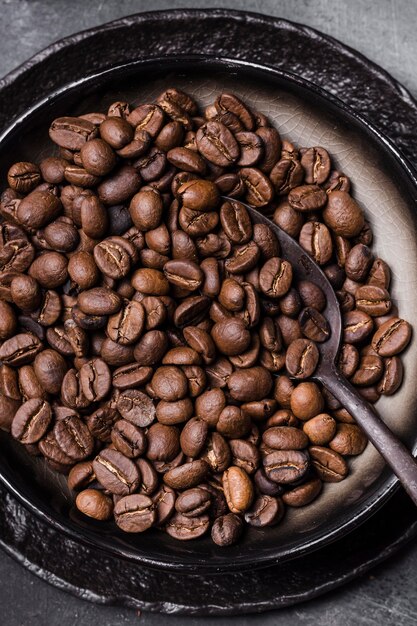 Flat lay coffee beans with spoon