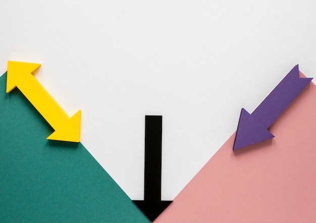 Flat lay colorful arrows and cardboards