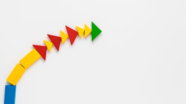 Free Photo flat lay colorful arrows in line on white background