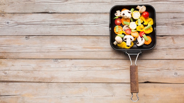 Free photo flat lay colorful assortment of vegetables with copy space