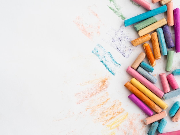 Flat lay of colorful chalk with copy space