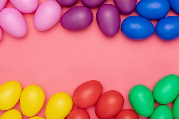 Flat lay colorful eggs for easter