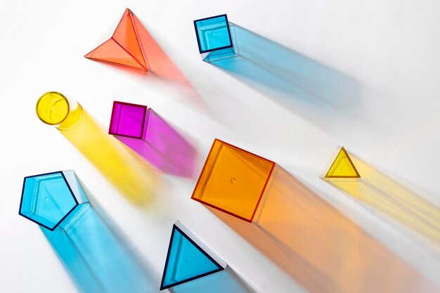 Flat lay of colorful translucent geometric shapes