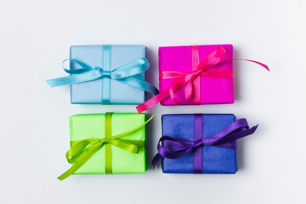 Free Photo flat lay colourful birthday gifts 