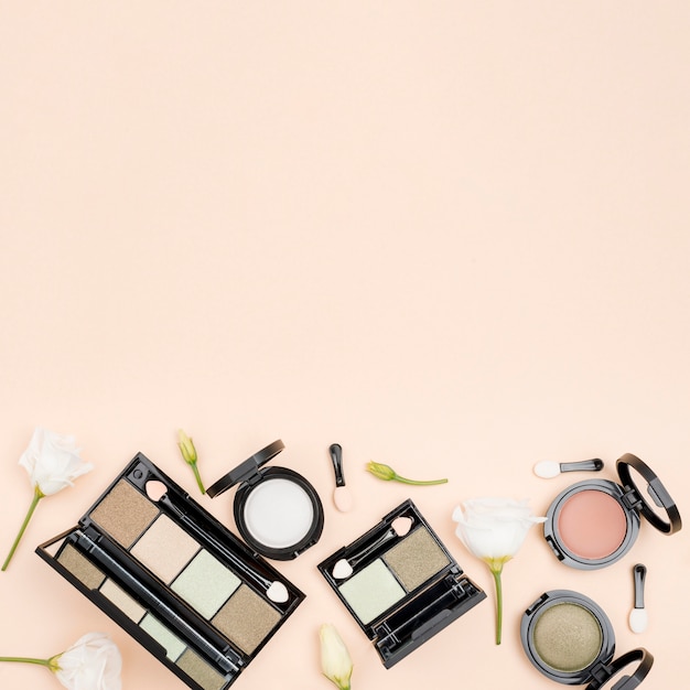 Flat lay composition of beauty products with copy space