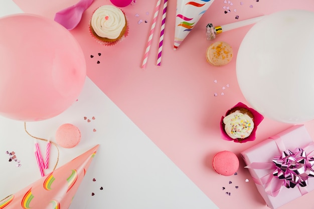 Flat lay composition of birthday elements with copyspace