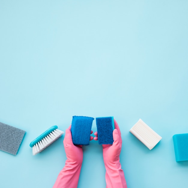 Flat lay composition of cleaning products with copyspace