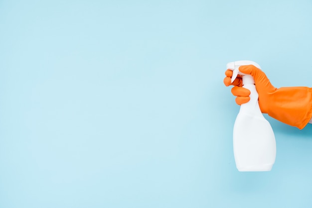 Flat lay composition of cleaning products with copyspace