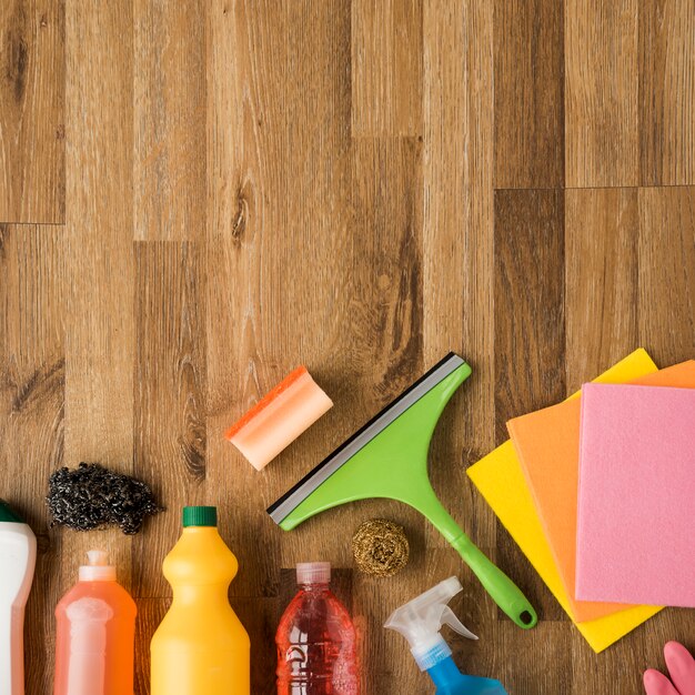 Flat lay composition of cleaning products with copyspace