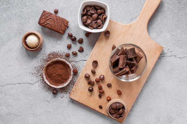 Free photo flat lay composition of delicious chocolate products