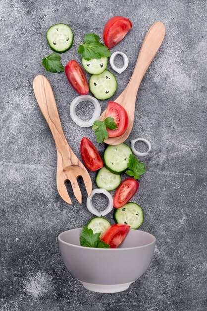 Flat lay composition of different ingredients on cement background