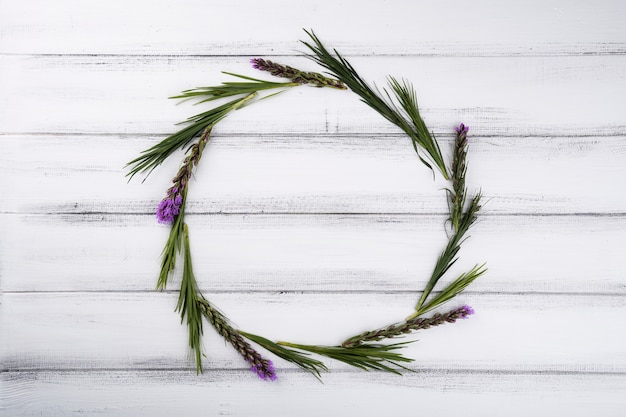 Flat lay composition of flowers with frame concept