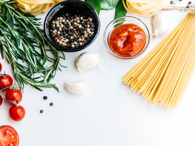 Free photo flat lay composition of pasta with copyspace