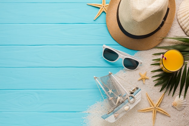 Free Photo flat lay composition with beach accessories