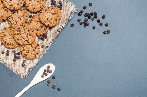 Flat lay cookies frame with spoon and copy-space