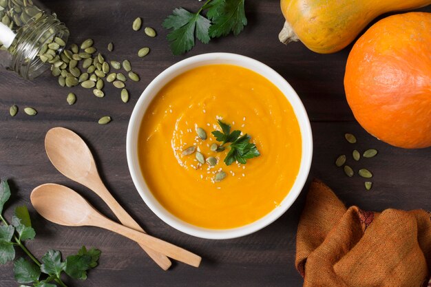 Flat lay cream soup and seeds