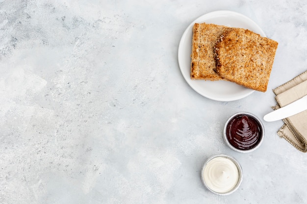 Flat lay decoration with toast and sauces