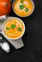 Free photo flat lay delicious autumn soup arrangement with copy space