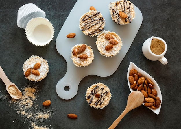 Free photo flat lay of delicious cupcakes concept