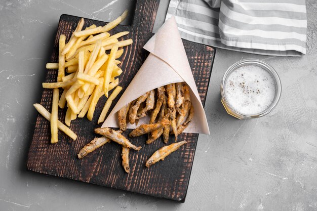 Flat lay of delicious fish and chips concept